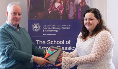 Amy receives her Google Nexus from Dr Thomas