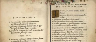 A close up of a double-page spread from Ovid's first volume of the Aldine edition of Ovid's works (Venice: 1502), including "Metamorphoses", which is embellished with MS decoration and illumination.