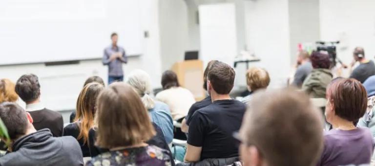 Audience watching a seminar