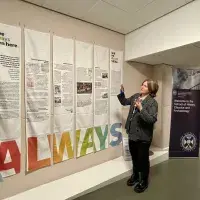 Ash Scholz talks through the exhibition at the launch event