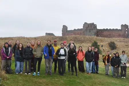 Archaeology students in front of Tantallon Castle.