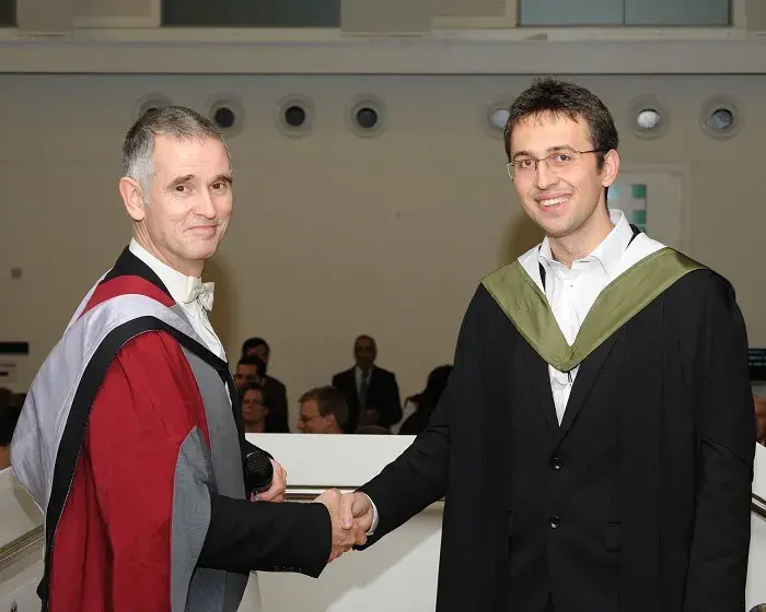two men shaking hands