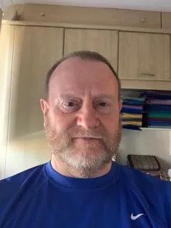 Man in blue shirt