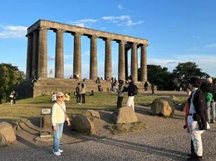 HCA Calton Hill monument with people walking around it