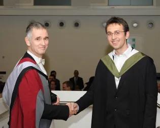 two men shaking hands