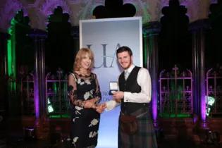 Image of Joe Thompson receiving Undergraduate Award