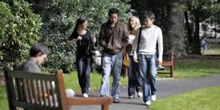 A group of students walking in George Square