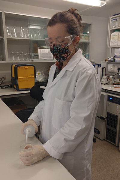 HCA PhD researcher Emma Smith beginning the collagen extraction process in the department labs. 