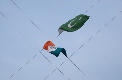 At the end of the guard changing ceremony at the Pakistan-India border the respective flags are lowered.